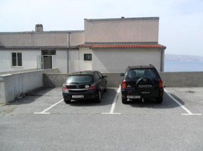 Apartments with a parking space Senj - 11605